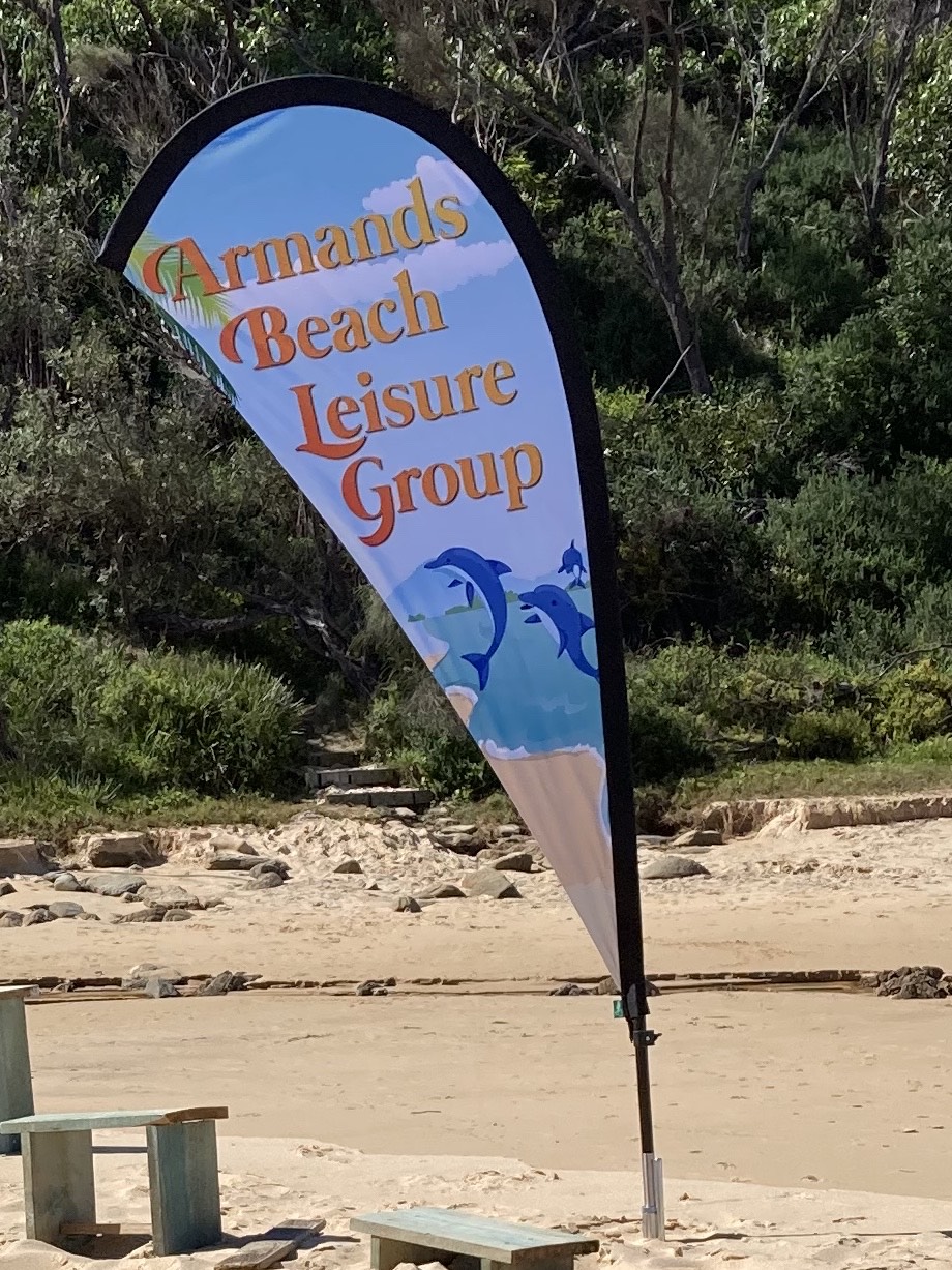 Look for the flag of Armands Bay Leisure Group on the beach